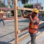 Migrantes varados por restricciones de Trump trabajan en Tapachula para sobrevivir 